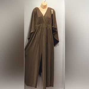 One piece Jumpsuit with cape.